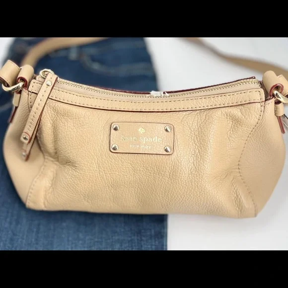 Cream color Kate spade. Great condition. Black and white polka dot inside. - Picture 2 of 5